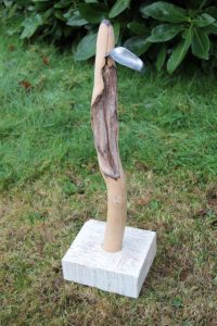 'graft of transference' (c.), laburnum, lead, wood base,25x10x11ins.